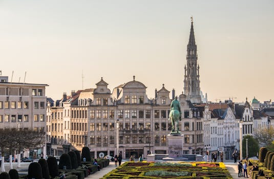 pexels-photo-2587789-2587789 A beautiful cityscape of Brussels with the iconic Town Hall tower and vibrant gardens.